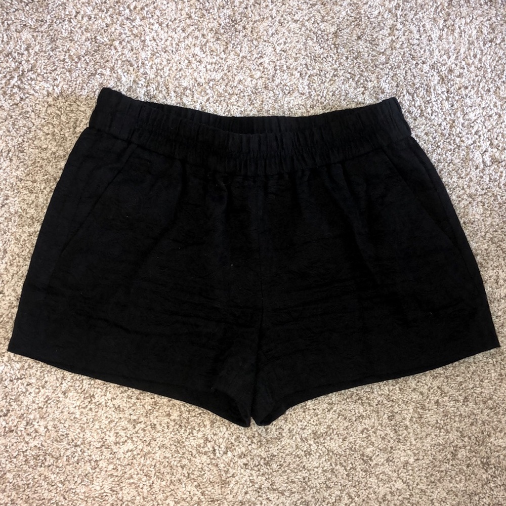 Barley worn floral print black J. Crew shorts.